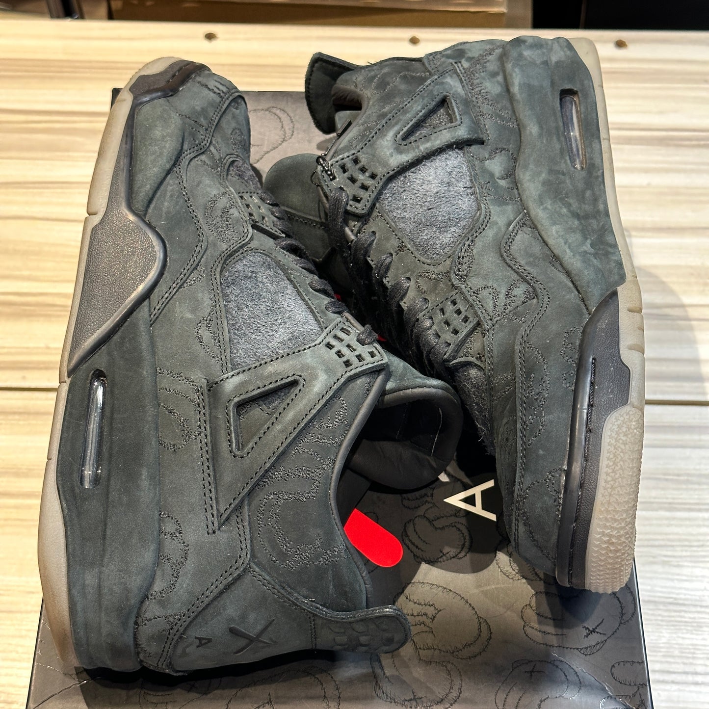 USED Jordan 4 Retro KAWS Black