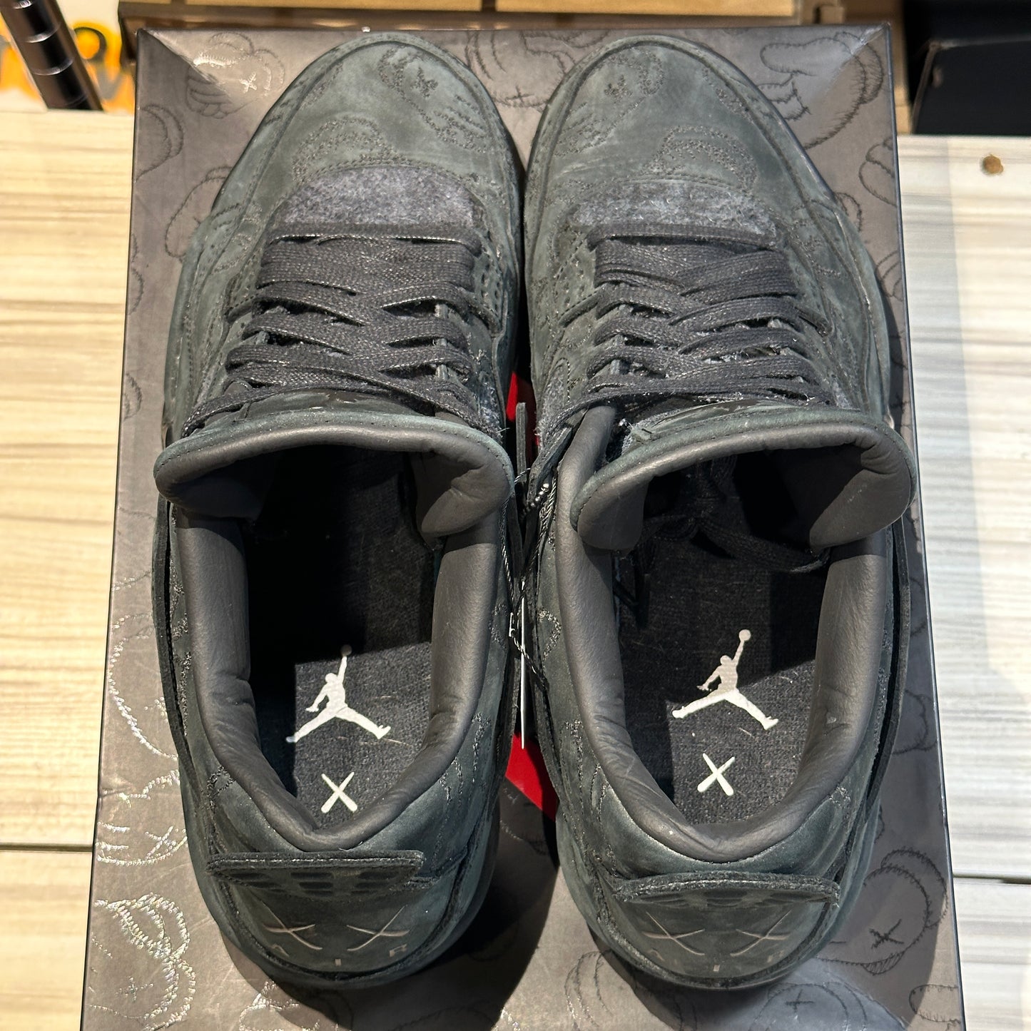 USED Jordan 4 Retro KAWS Black