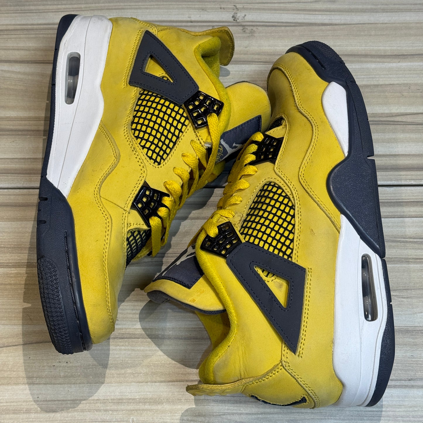 USED Jordan 4 Retro Lightning