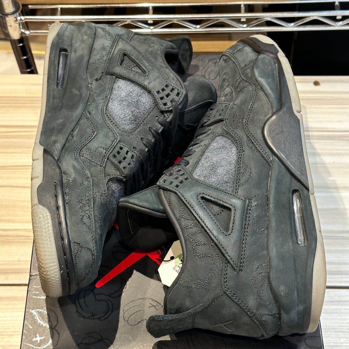 USED Jordan 4 Retro KAWS Black